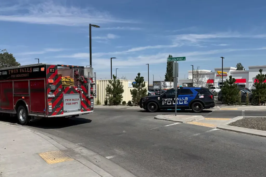 Twin Falls fire truck and police car at the scene of a shooting outside an In-N-Out Burger restaurant.