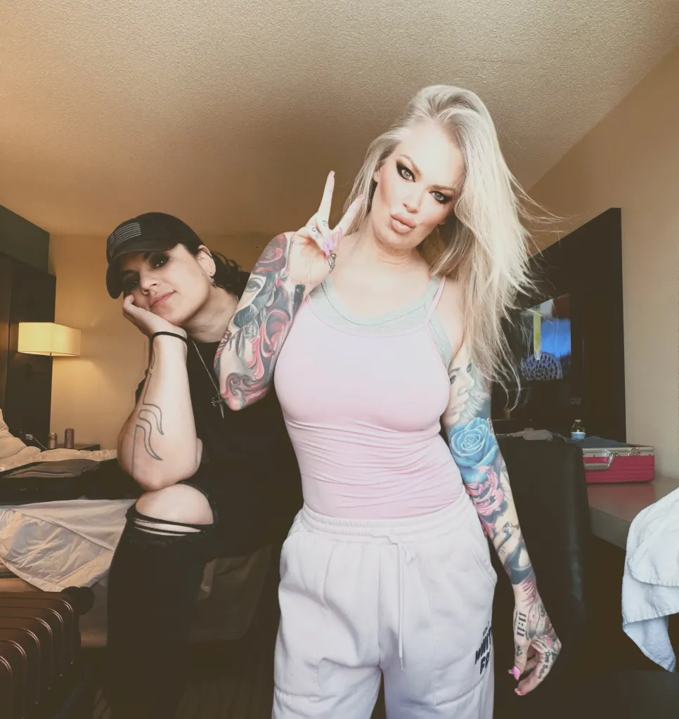 Jenna Jameson posing with Mil R. Ocampo.