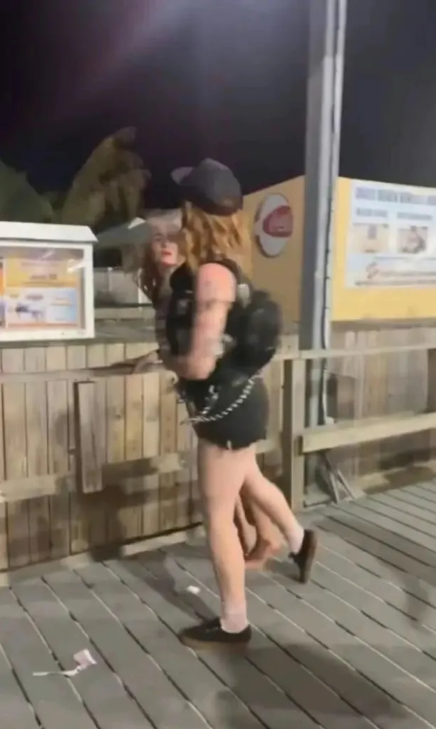 Kaitlyn Tracey, 33, is seen slapping a woman at the Point Pleasant Beach boardwalk in New Jersey on July 3, 2026.