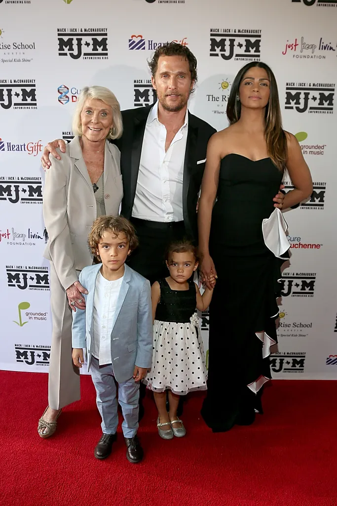 Kay McConaughey, Levi McConaughey, Matthew McConaughey, Vida McConaughey, and Camila Alves walk the red carpet.