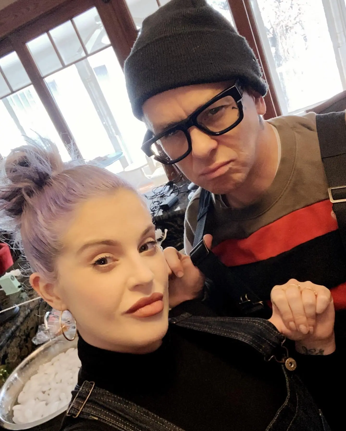 Kelly Osbourne and Sidney George Wilson posing for a photo.