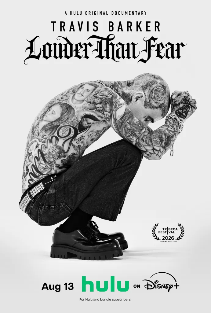 A black and white illustration of Travis Barker, heavily tattooed, crouching with his head bowed and arms covering his face, advertising the documentary "Travis Barker: Louder Than Fear" streaming on Hulu and Disney+.