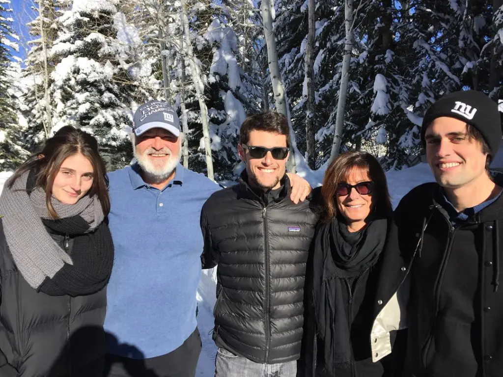 Romy, Rob, Jake, Michelle, and Nick Reiner posing for a picture in a snowy forest.