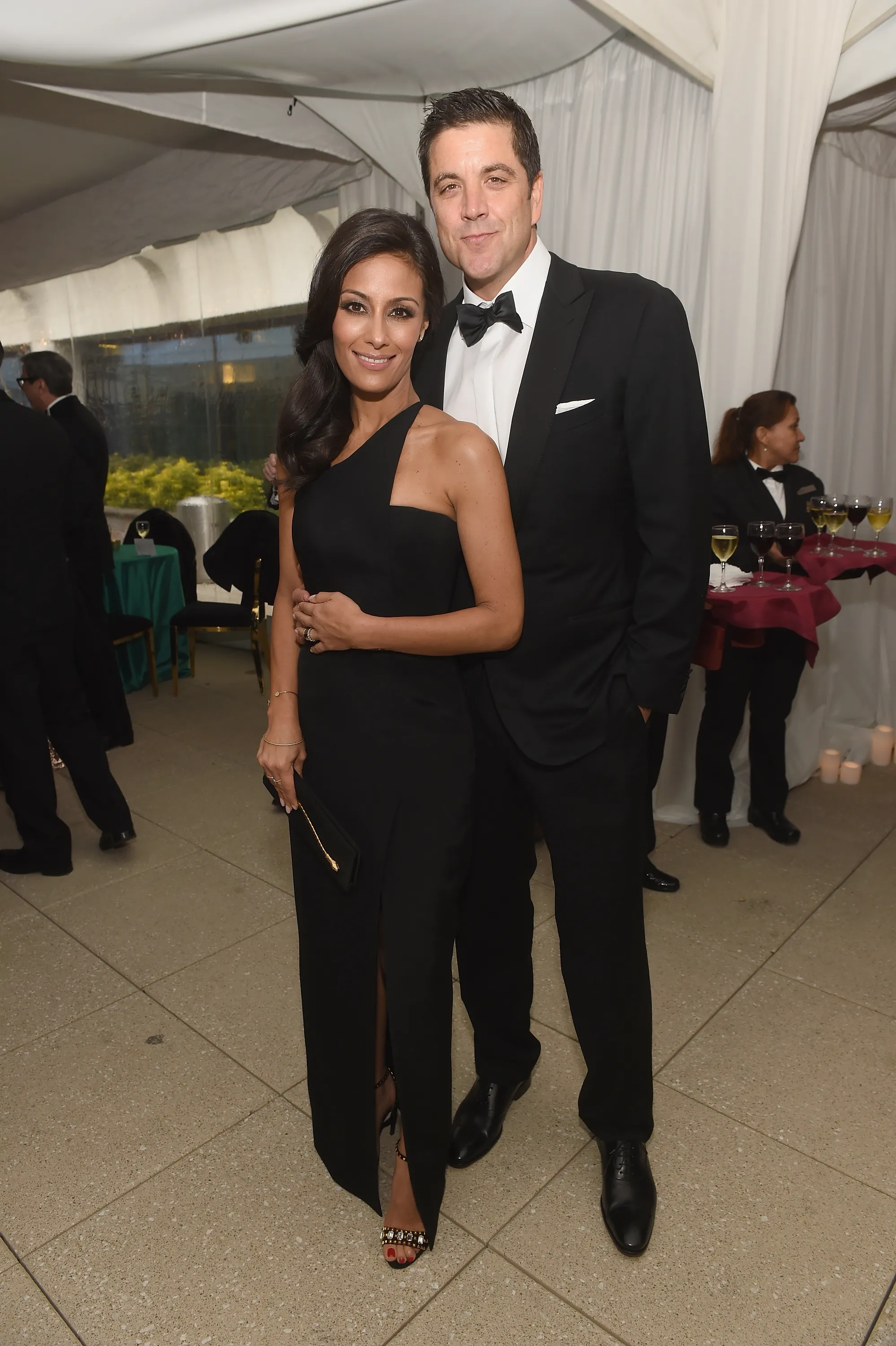 Liz Cho and Josh Elliott posing together at the Atlantic Media's 2016 White House Correspondents' Association Pre-Dinner Reception.