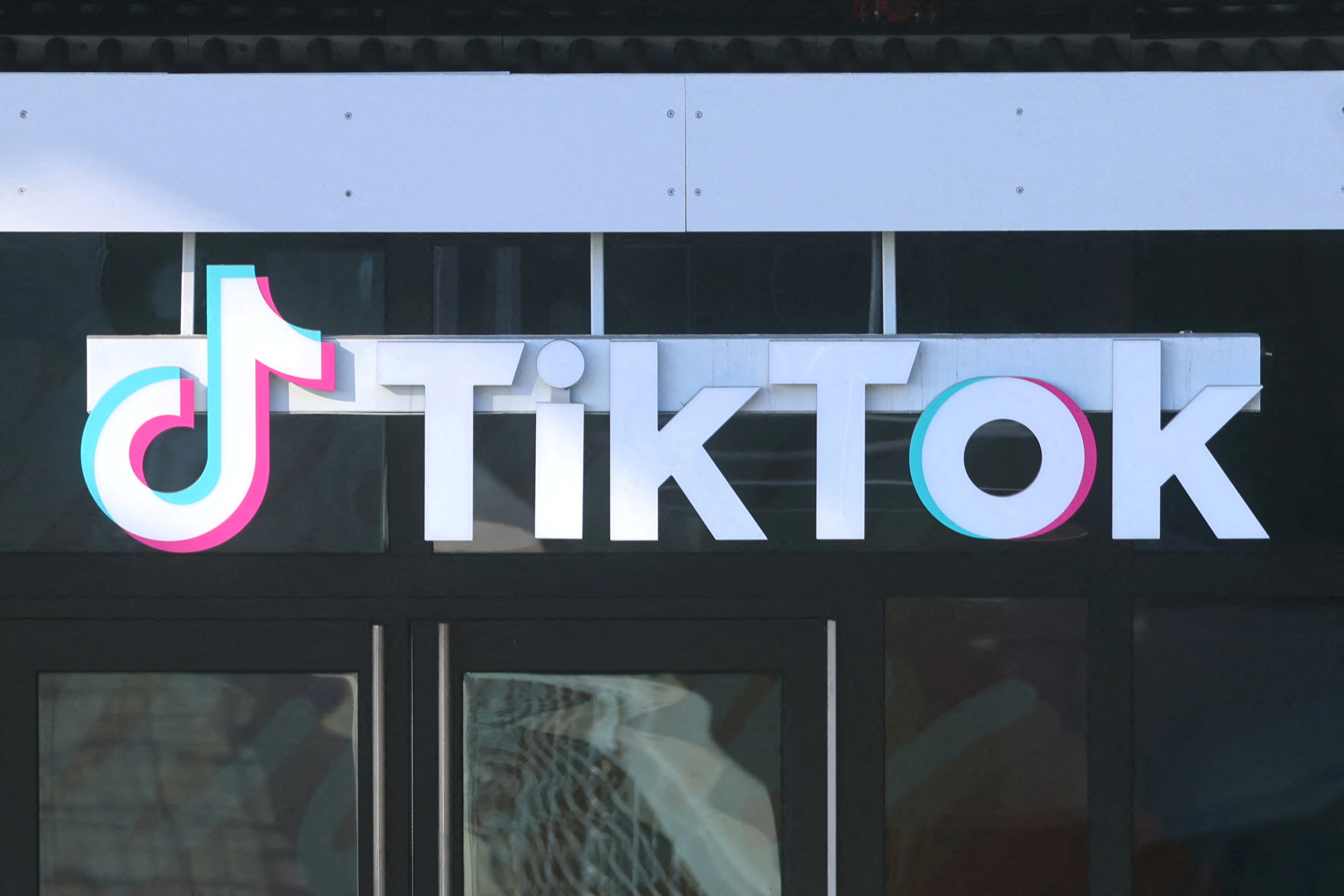 The TikTok logo displayed over a door.