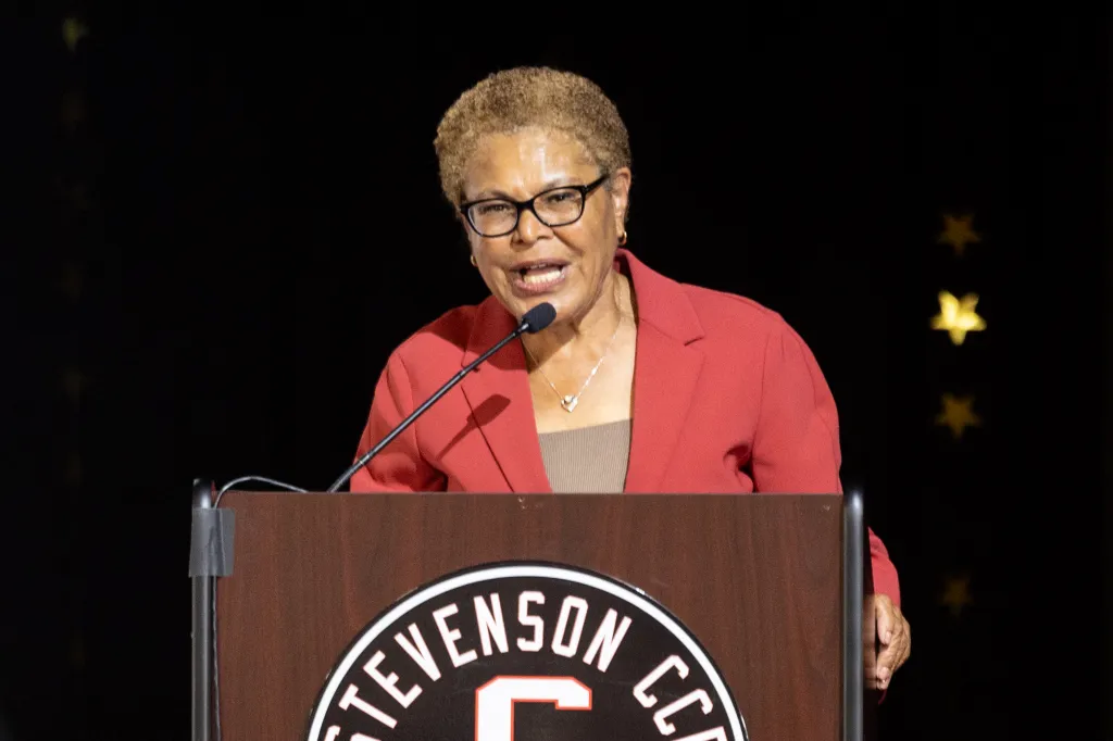 Los Angeles Mayor Karen Bass speaking at a podium.