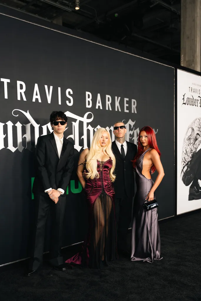 Landon Barker, Alabama Barker, Travis Barker, and Atiana De La Hoya at the premiere of "Travis Barker: Louder Than Fear."
