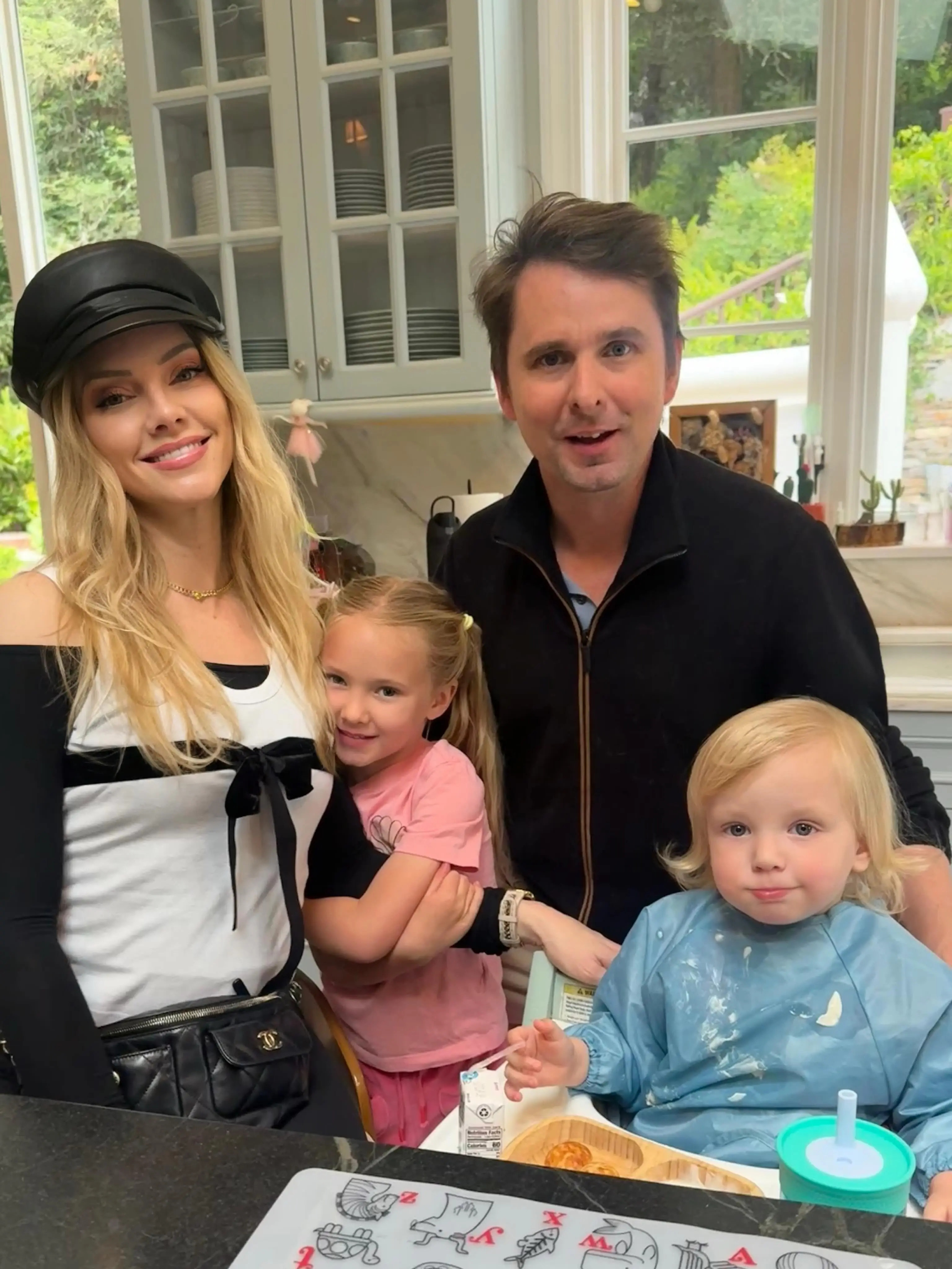 Matt Bellamy and Elle Evans with their two children.