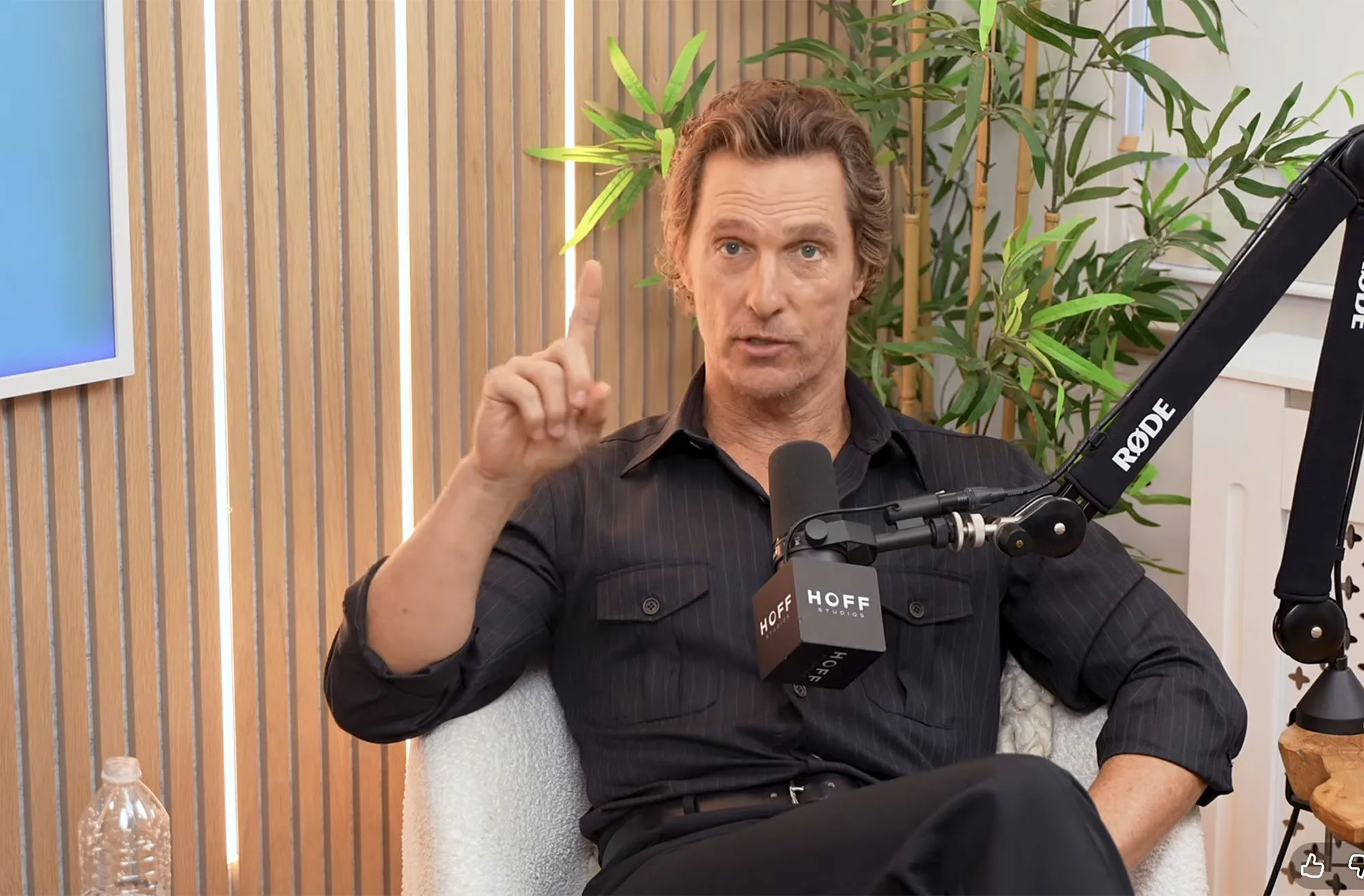 Matthew McConaughey speaking into a microphone.