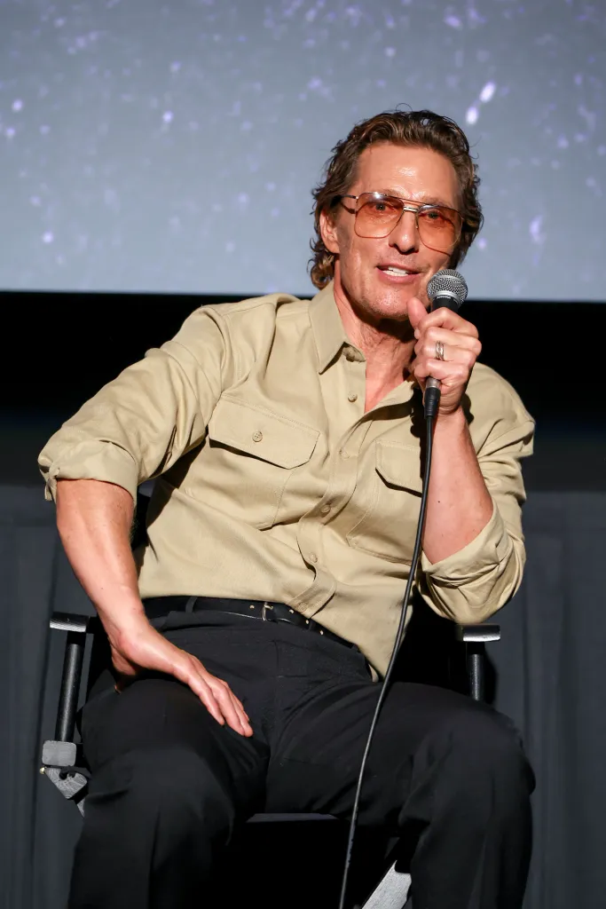 Matthew McConaughey speaking into a microphone.