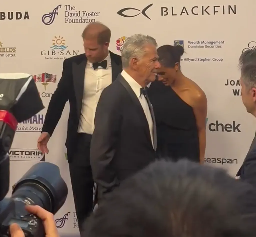 Meghan Markle and Prince Harry at an event with David Foster.