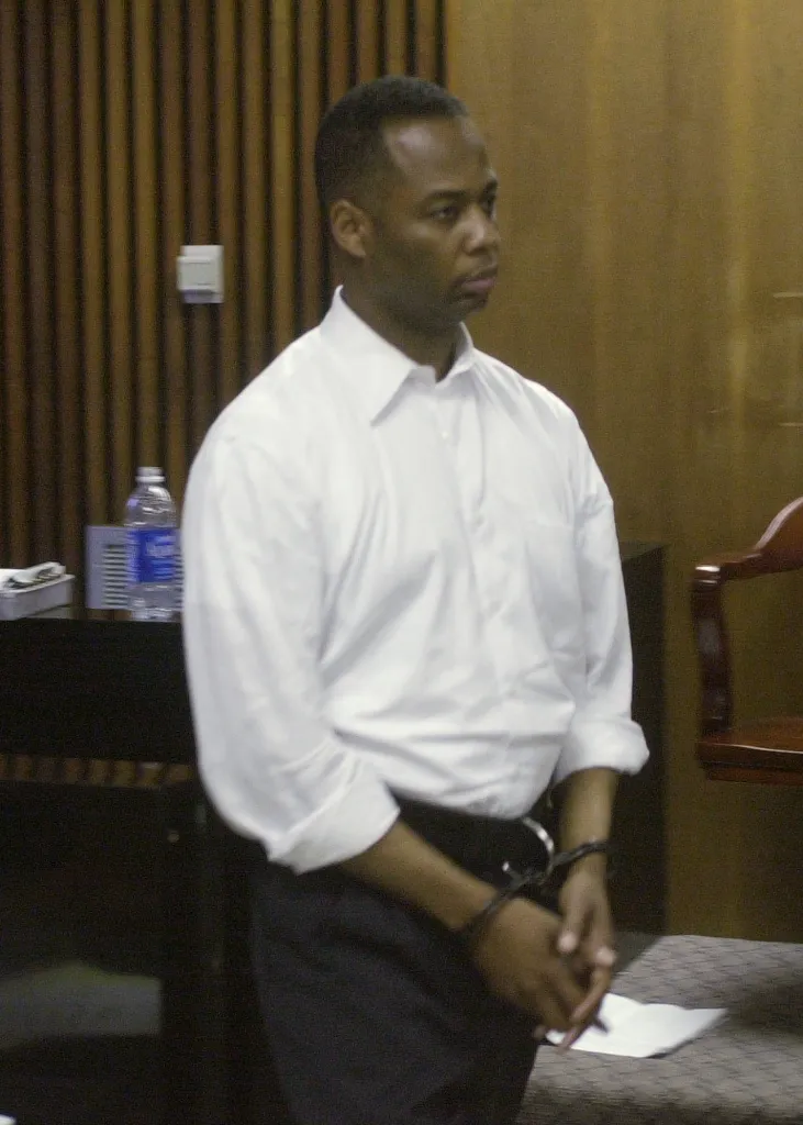 Michael Boxley, chief counsel to New York Assembly Speaker Sheldon Silver, in handcuffs during court appearance.