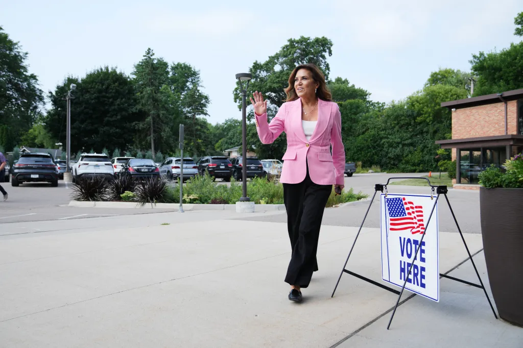 Michele Tafoya, a Republican candidate for U.S. Senate, arrives to vote in Minneapolis.
