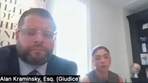 Milania Giudice with attorney Alan Kraminsky during an arraignment hearing.