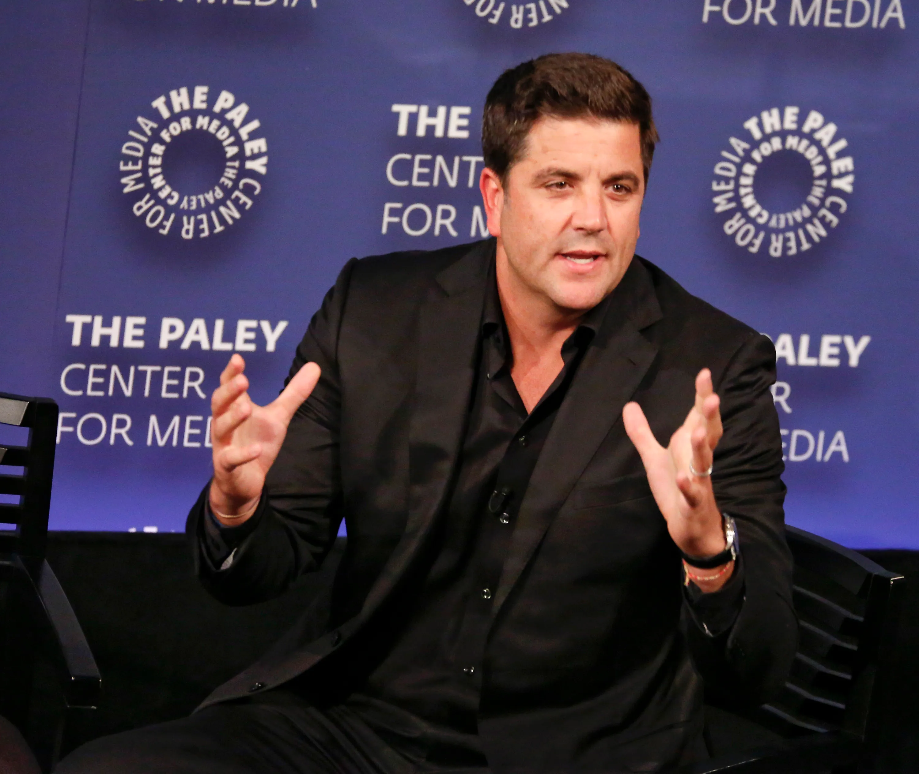 CBS News reporter Josh Elliott speaking at PaleyFest.