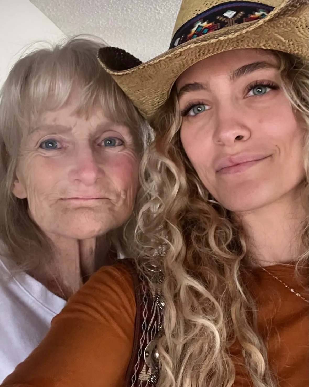 Paris Jackson and Debbie Rowe, mother and daughter, pose for a photo.