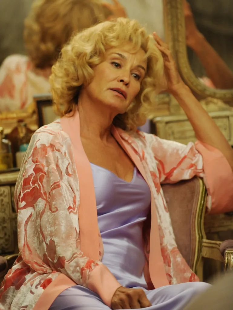 Jessica Lange in a pink robe and purple nightgown in "American Horror Story: Murder House."