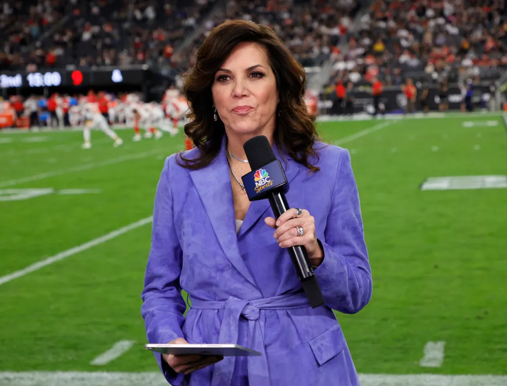 NBC "Sunday Night Football" sideline reporter Michele Tafoya holding a microphone.
