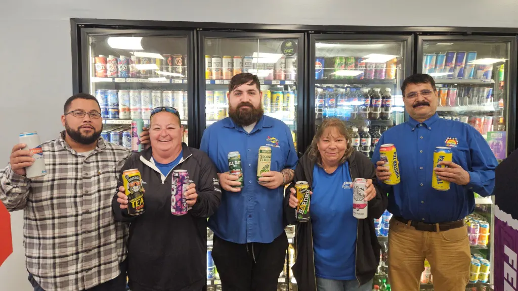 Customers dance on the store floor on Thursday, July 30, at the Sunoco & Halfmoon Car Wash in Clifton Park, New York. The gas station offered customers a 20% discount on the condition that they showed their best dance moves.