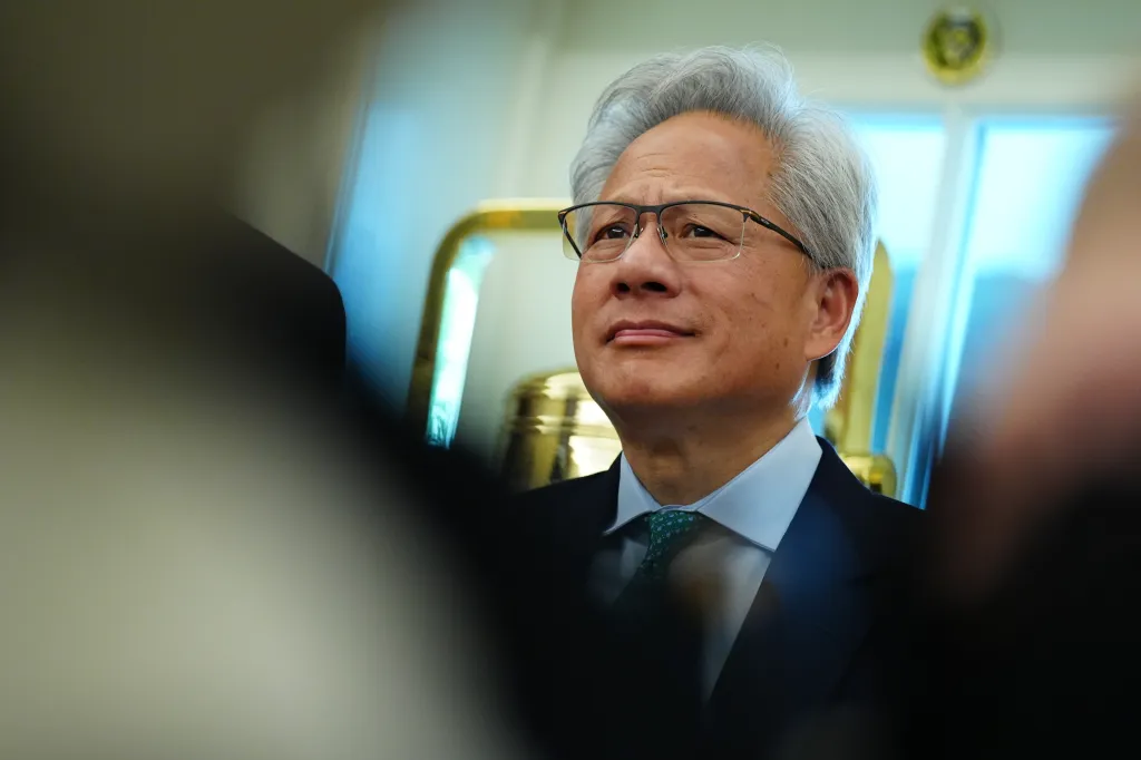 Jensen Huang, CEO of NVIDIA, listening in the Oval Office.