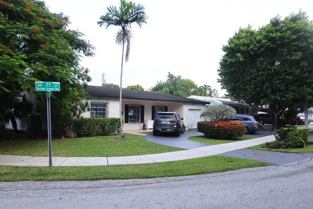 Perez Hilton's Miami home from the street, with a street sign for