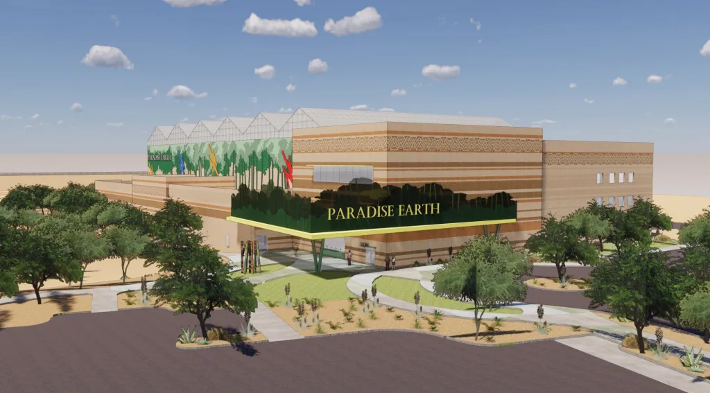 Illustration of the "Paradise Earth" facility, showing a large building with greenhouses on top, surrounded by trees and desert landscaping.