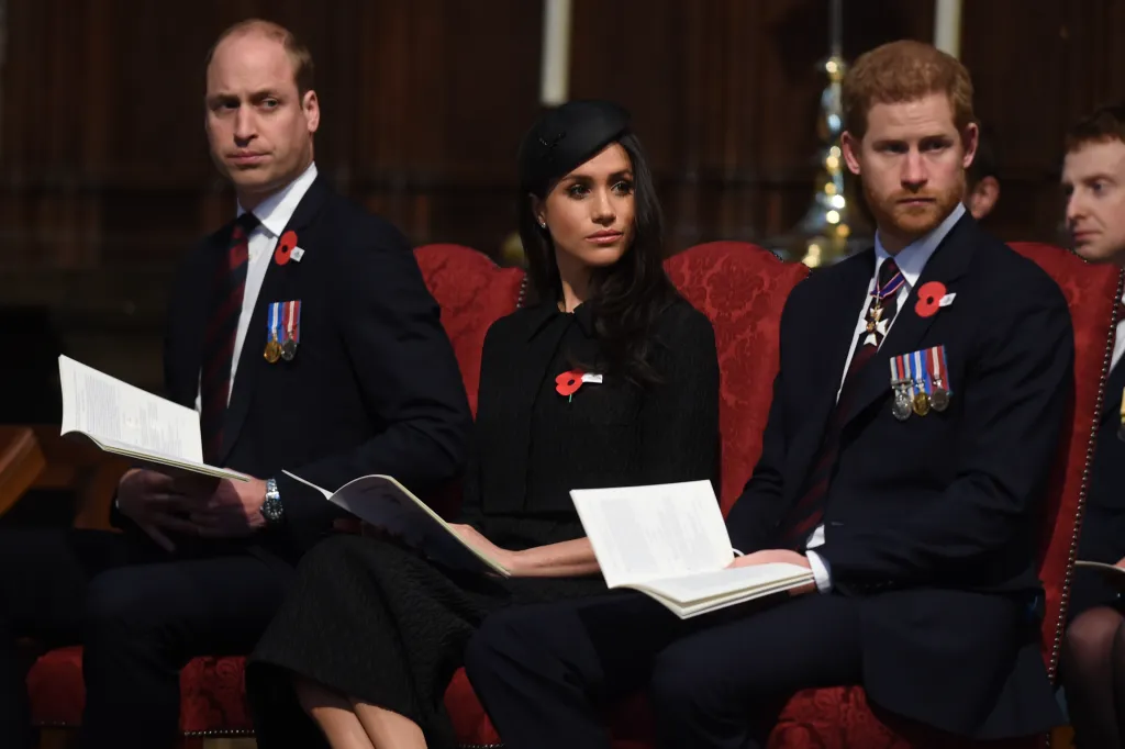 Prince William, Meghan Markle, and Prince Harry seated with booklets at an Anzac Day service.