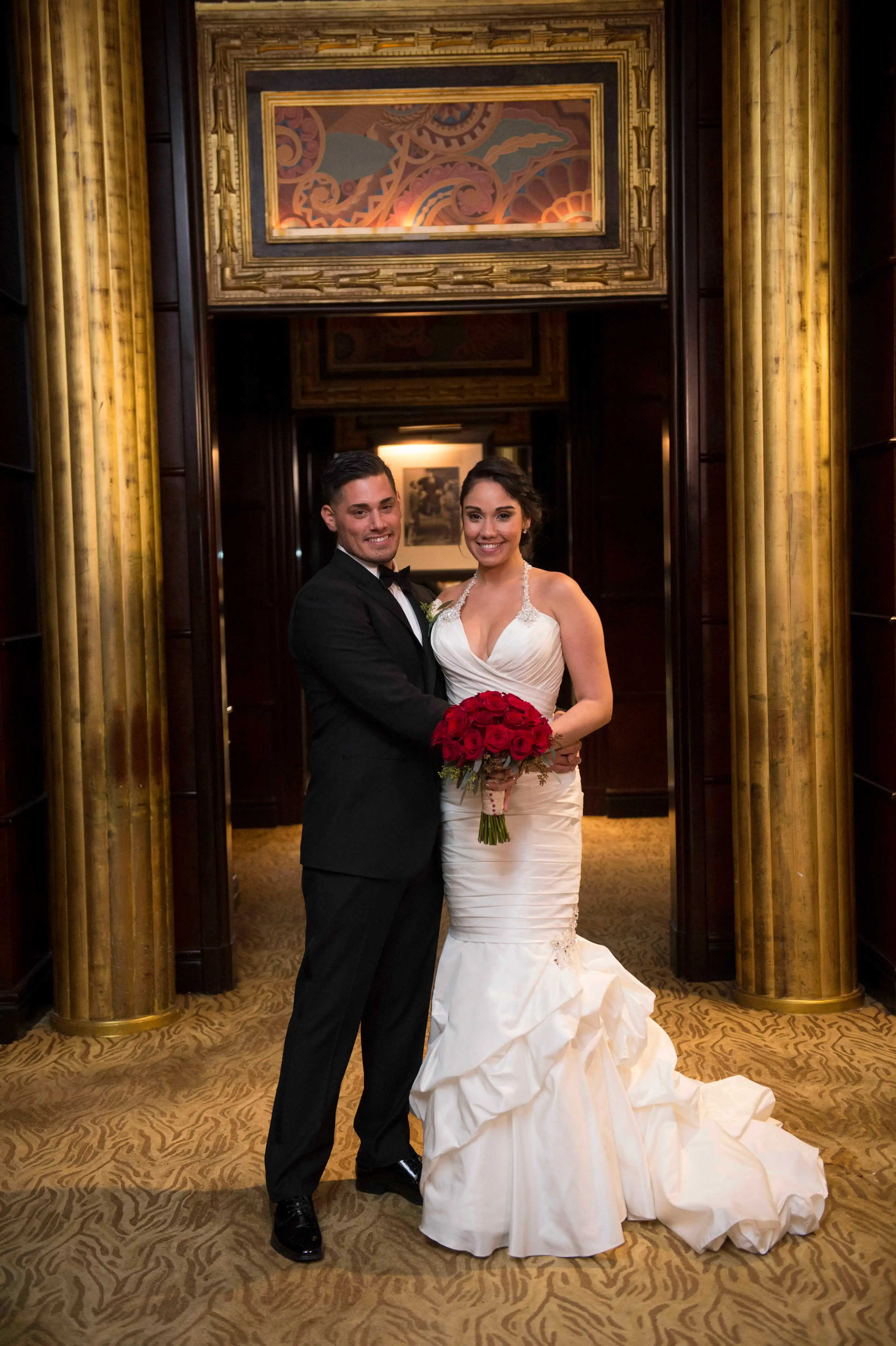 Ryan De Nino and Jessica Castro from "Married at First Sight" pose together at their wedding.