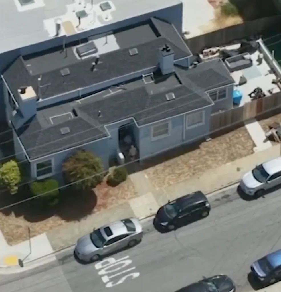 Drone footage showing undercover deputies tackling a suspect attempting to flee an online child predator sting.