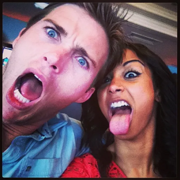 Scott Eastwood and Jewel Brangman making funny faces at the camera.