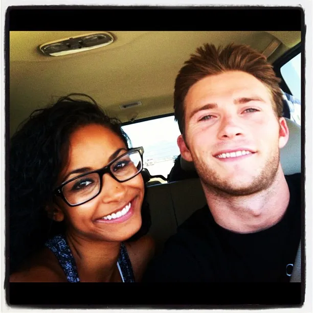 Scott Eastwood and Jewel Brangman posing for a selfie in a car.