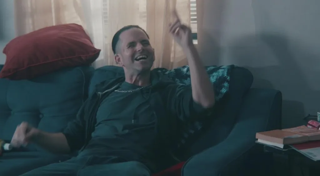 Shane Ryan-Reid laughing while pointing up in "Night Cops."