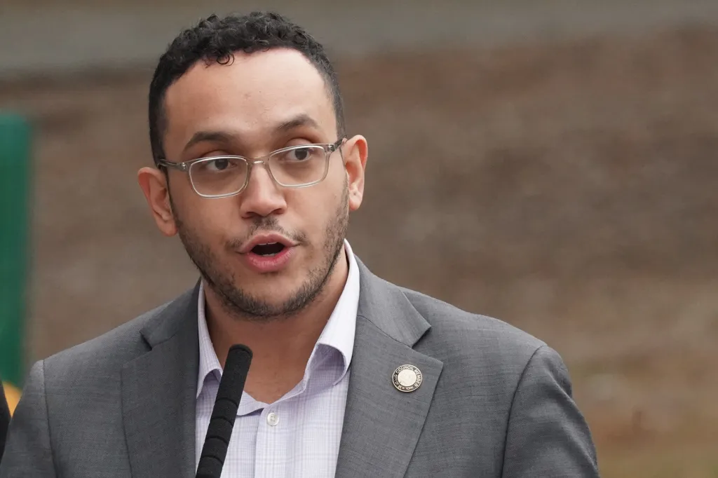 Council Member Shaun Abreu speaking to the press in West Harlem about a plan to create more public restrooms.