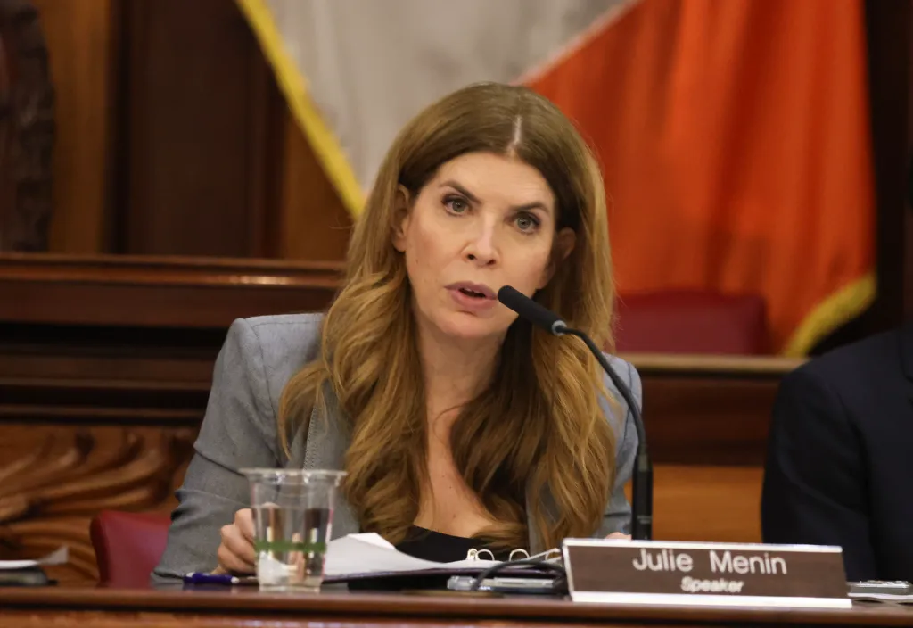 Julie Menin speaking at a City Council hearing.