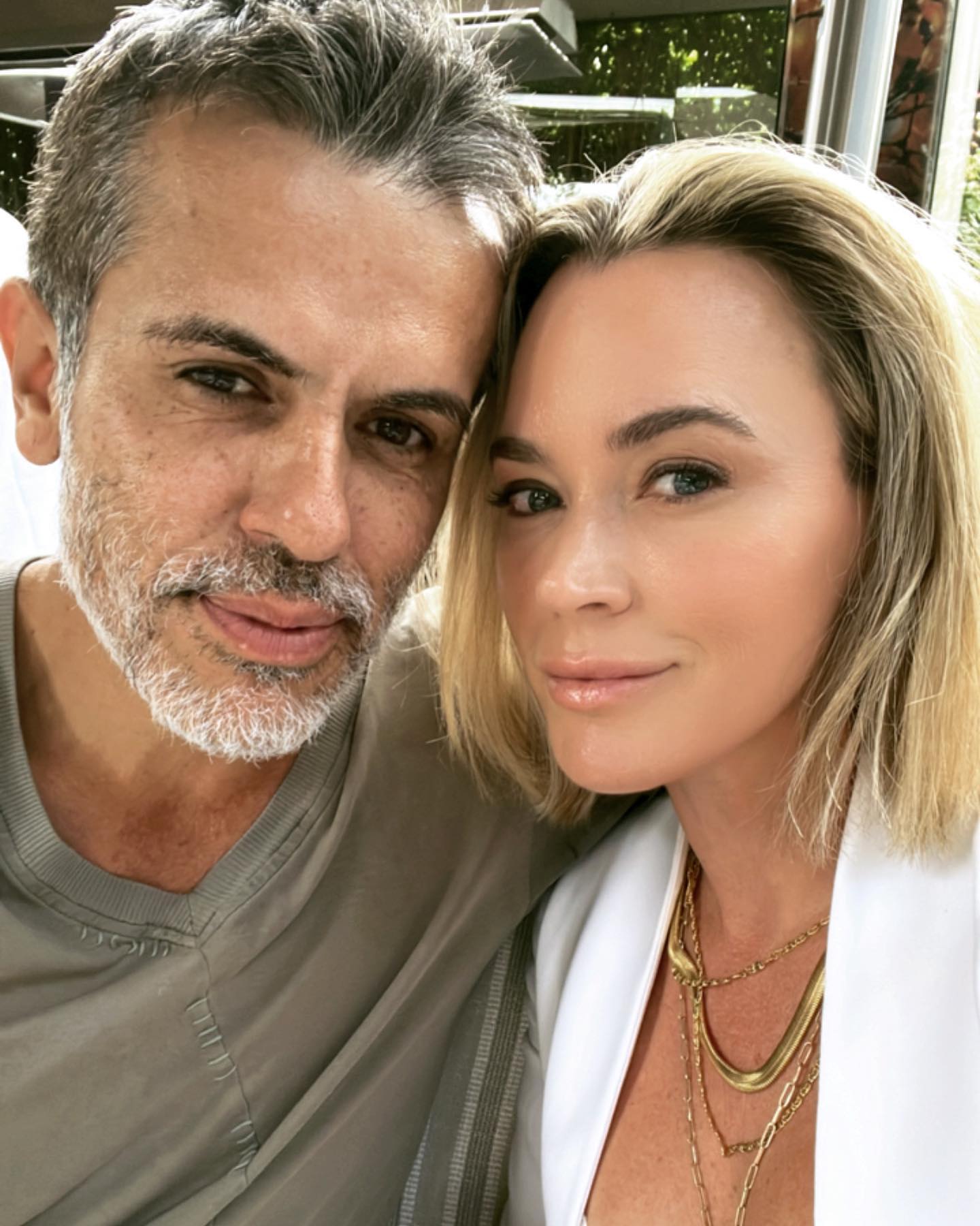 Teddi Mellencamp and Edwin Arroyave pose closely for a selfie.