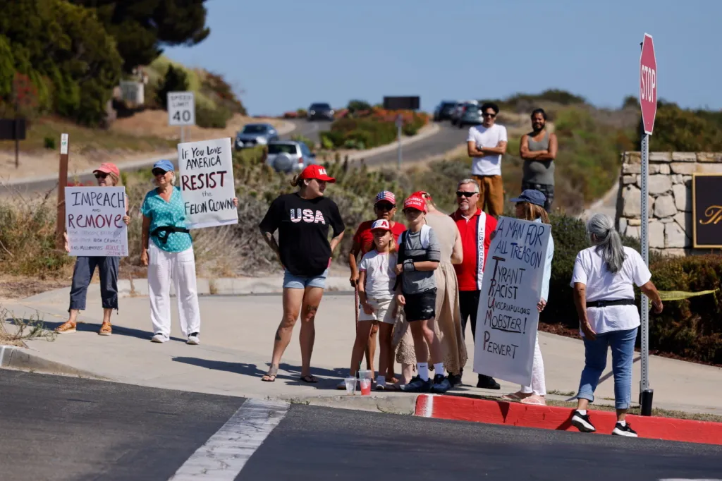 Protesters and counter-protesters gathered outside Trump National Golf Club.
