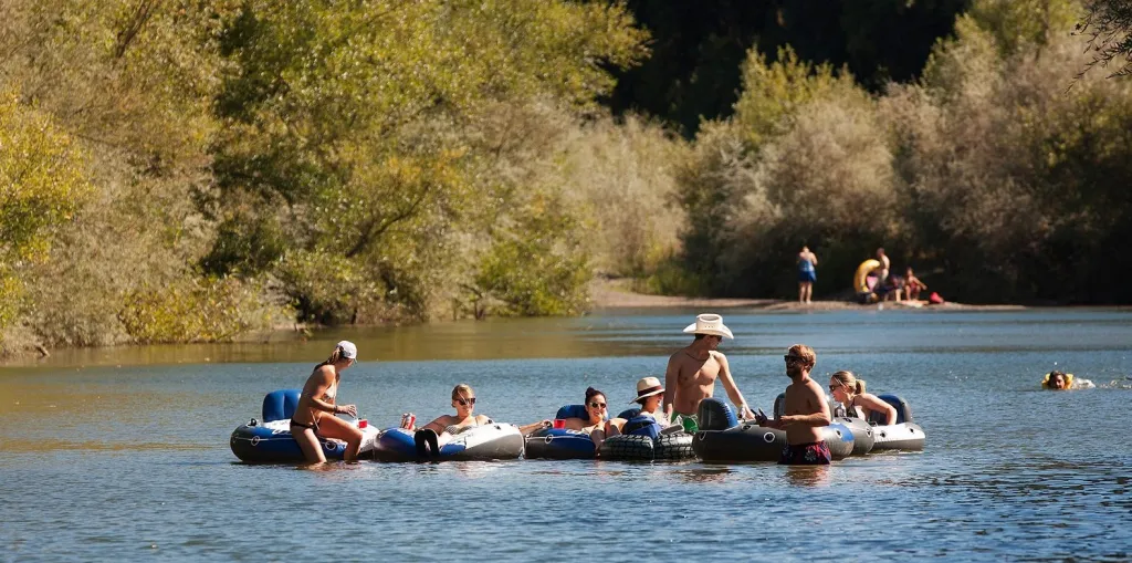 People tubing on the Russian River.