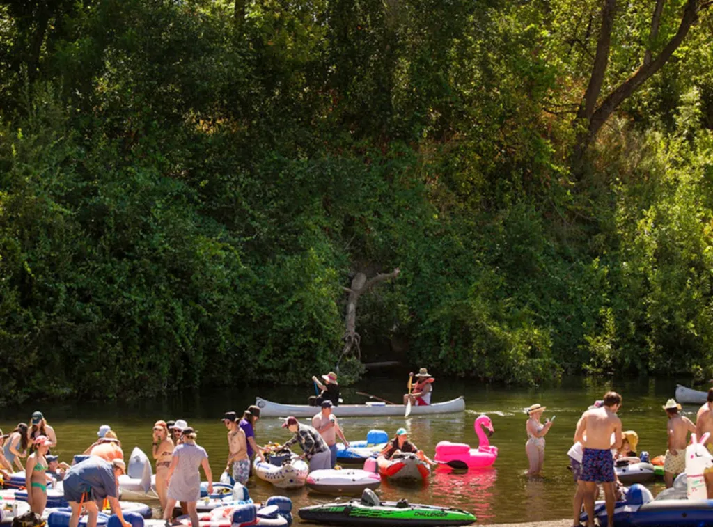 People tubing on the Russian River in California.