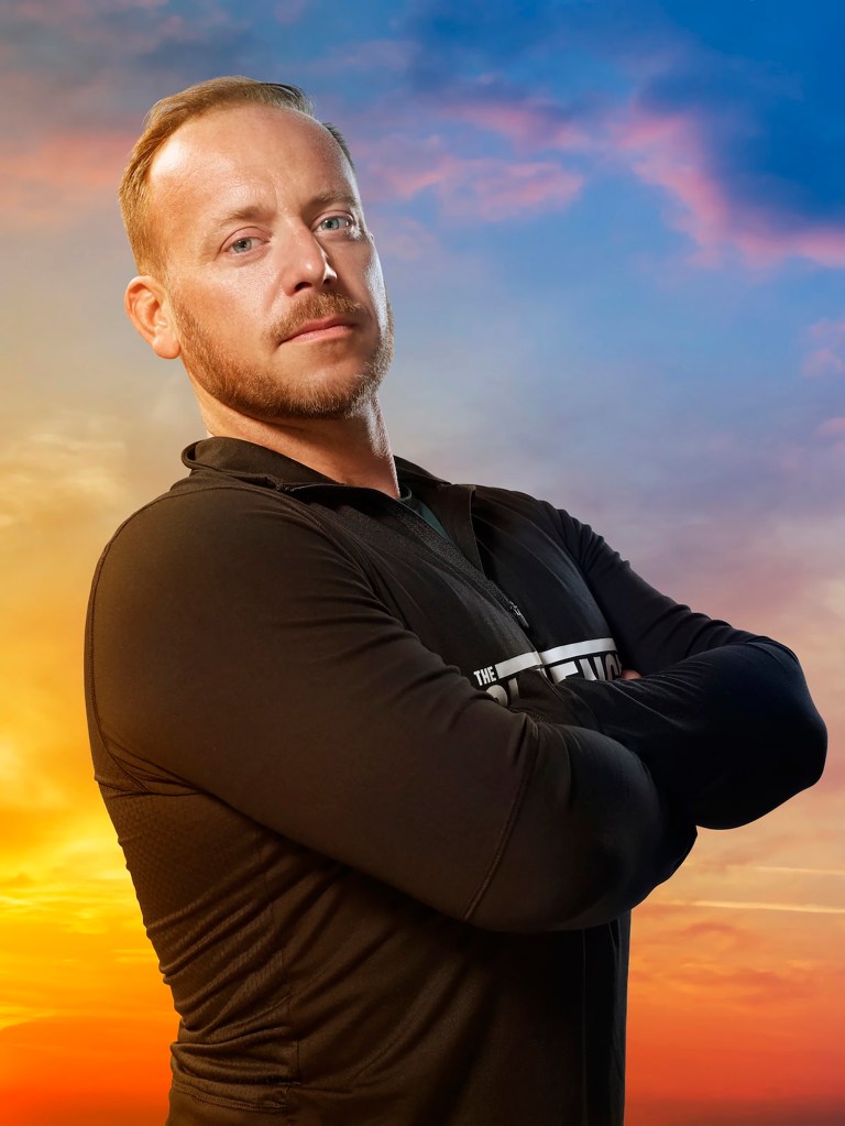 Tyler Duckworth from The Challenge, a reality competition show, with his arms crossed.
