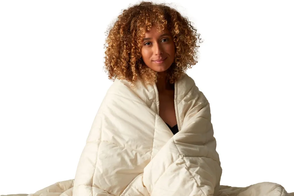 A woman wrapped in a blanket