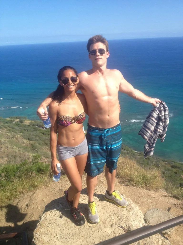 Scott Eastwood and Jewel Brangman posing together in Hawaii.
