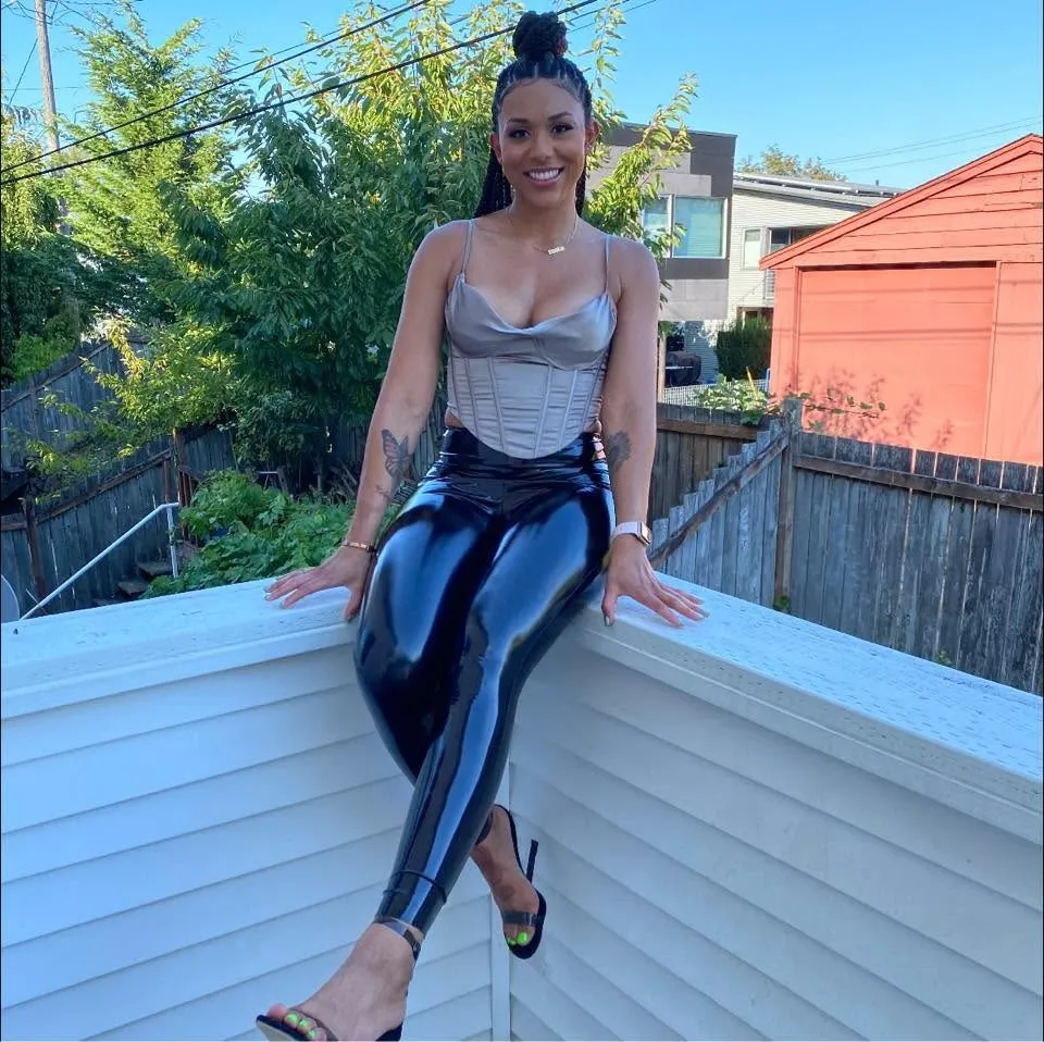 McKenna West sitting on a balcony