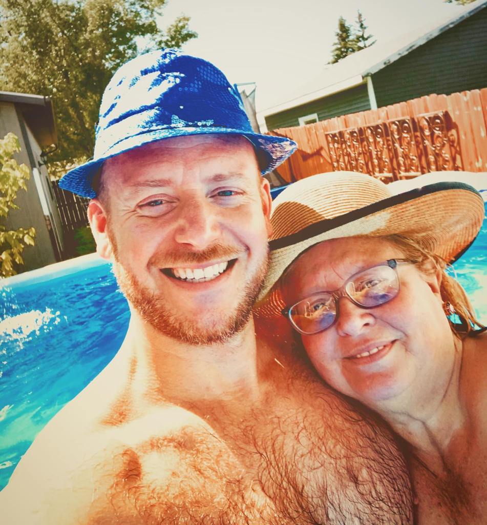 Tyler Duckworth and his mom Joni in a swimming pool.