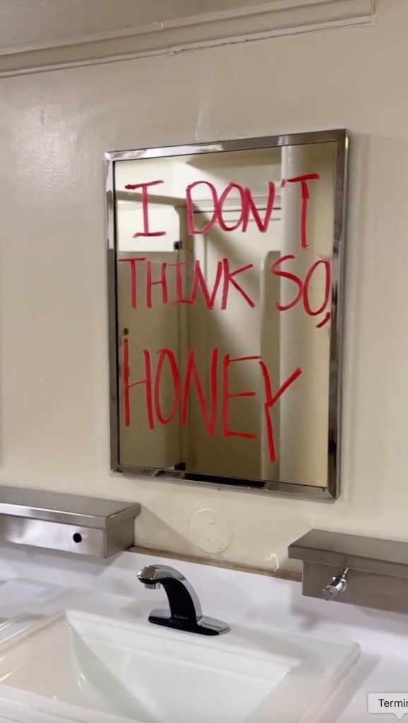 A mirror in a restroom with