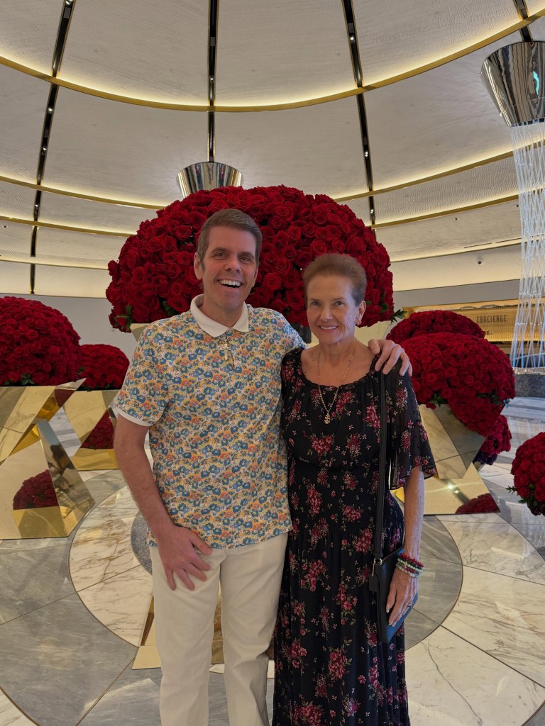 Perez Hilton posing with his mother, Teresita Lavandeira.