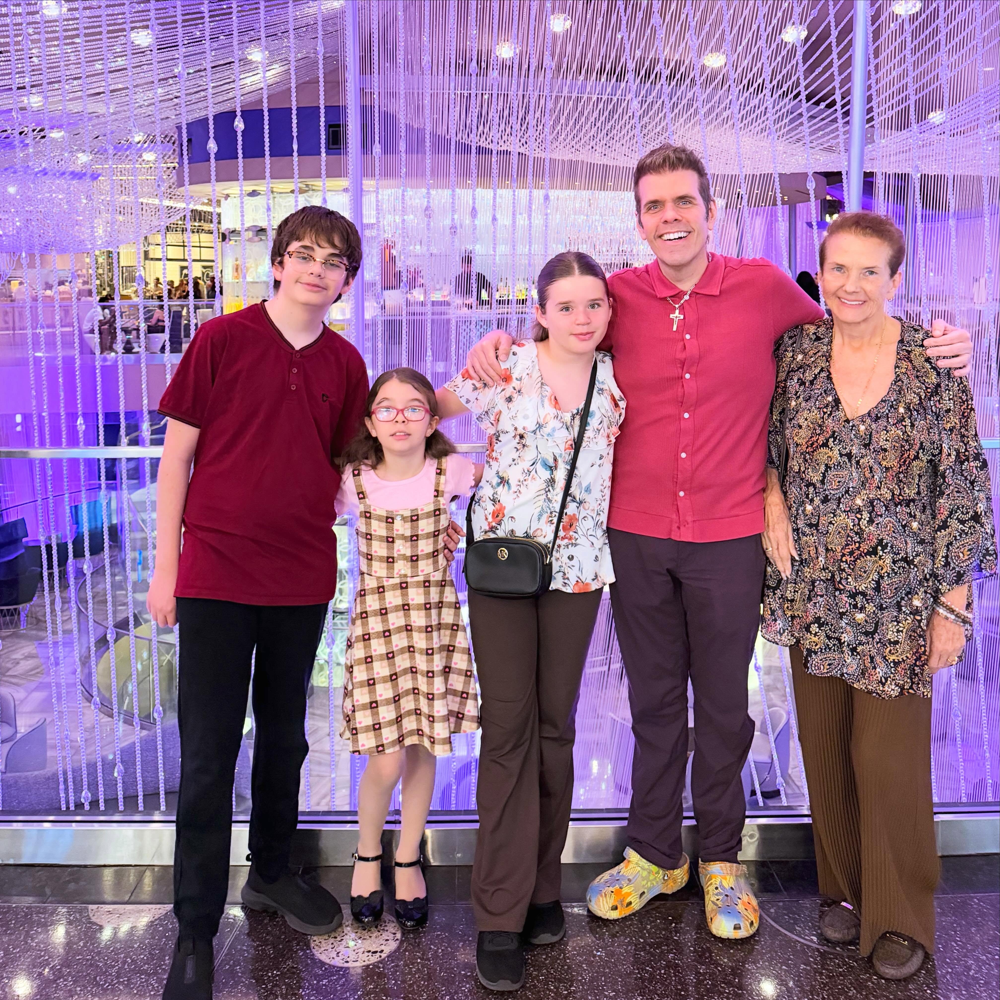 Perez Hilton with his mother and three children.