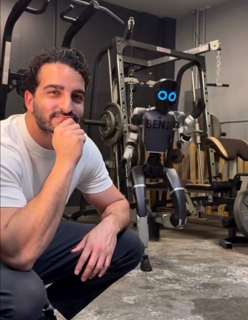 Aaron Mehdizadeh, the founder of The Robot Studio. He is young with dark hair and a beard and is wearing a whte t-shirt and dark pants.