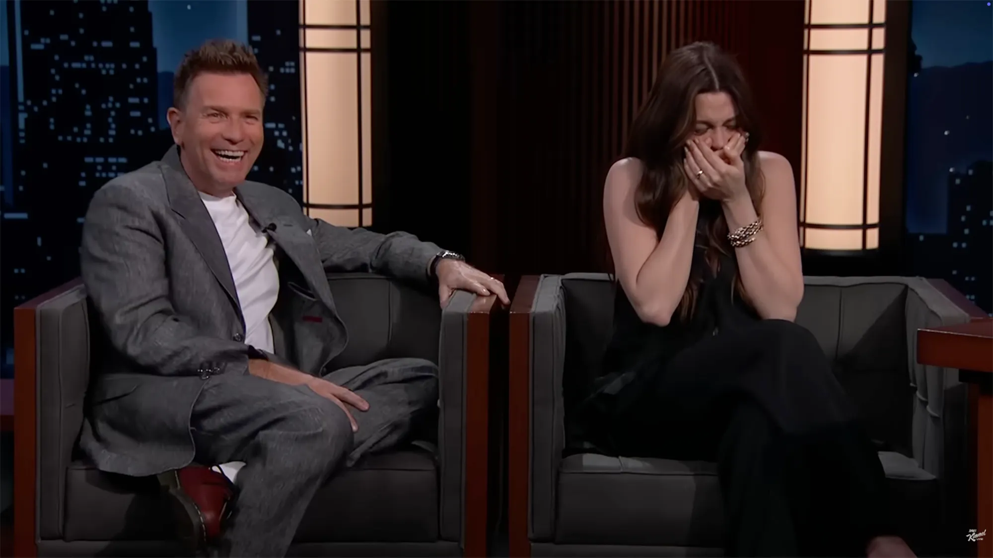 Ewan McGregor and Mary Elizabeth Winstead laughing on a talk show.
