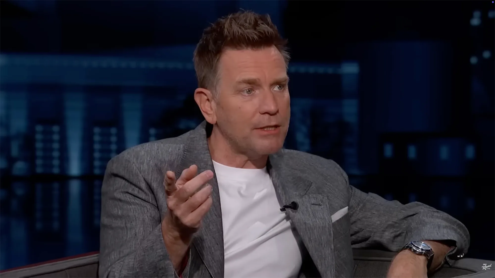 Ewan McGregor speaking with hand gesture during an interview.