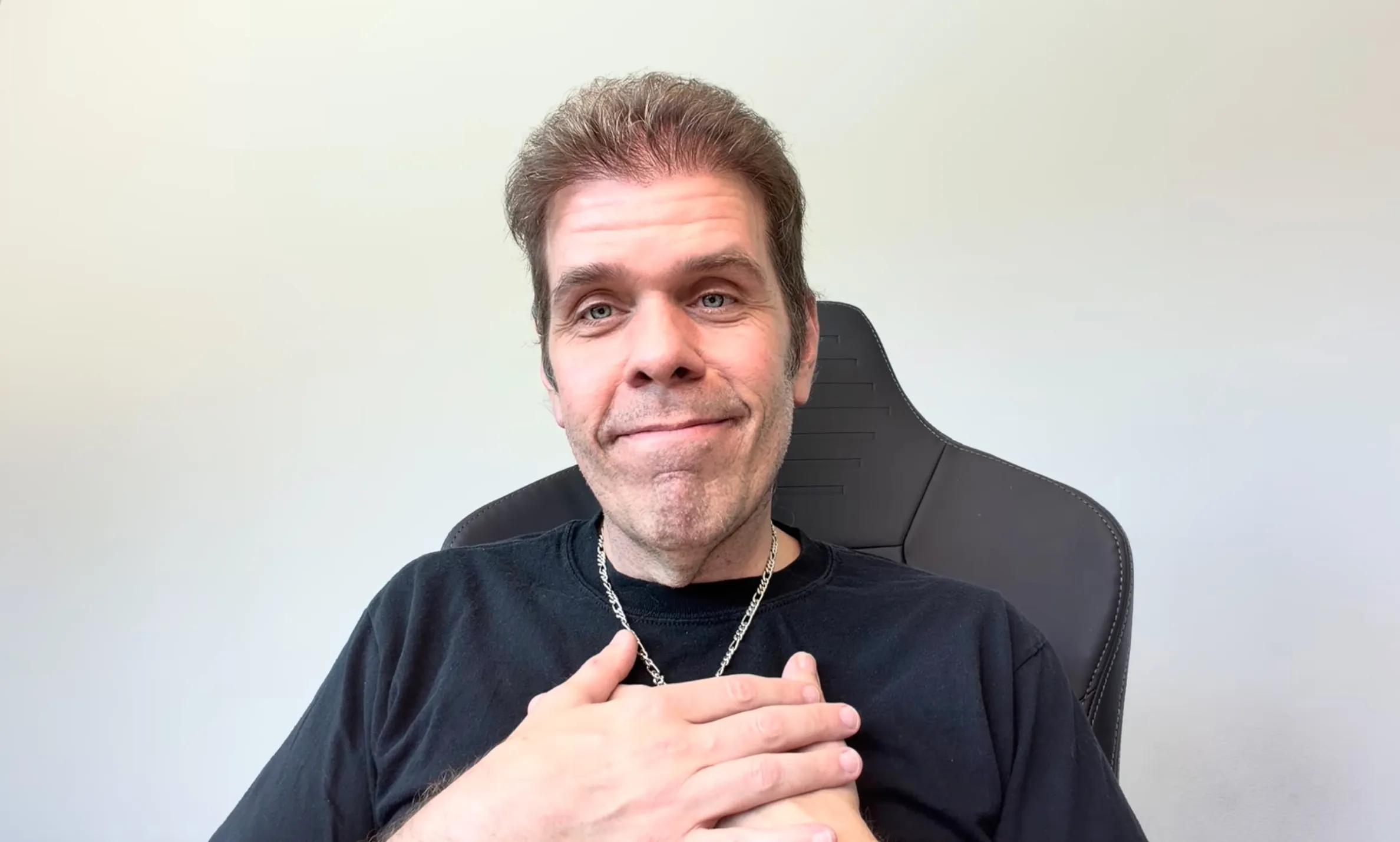 Mario Armando Lavandeira Jr. (Perez Hilton) with his hand over his heart.